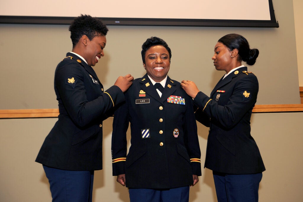 military woman getting promoted