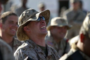 Marine Corps Pfc. laughing at jokes