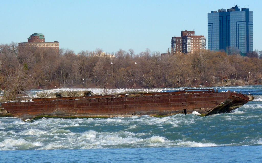 The rusted hull of a scow at Niagara Falls.