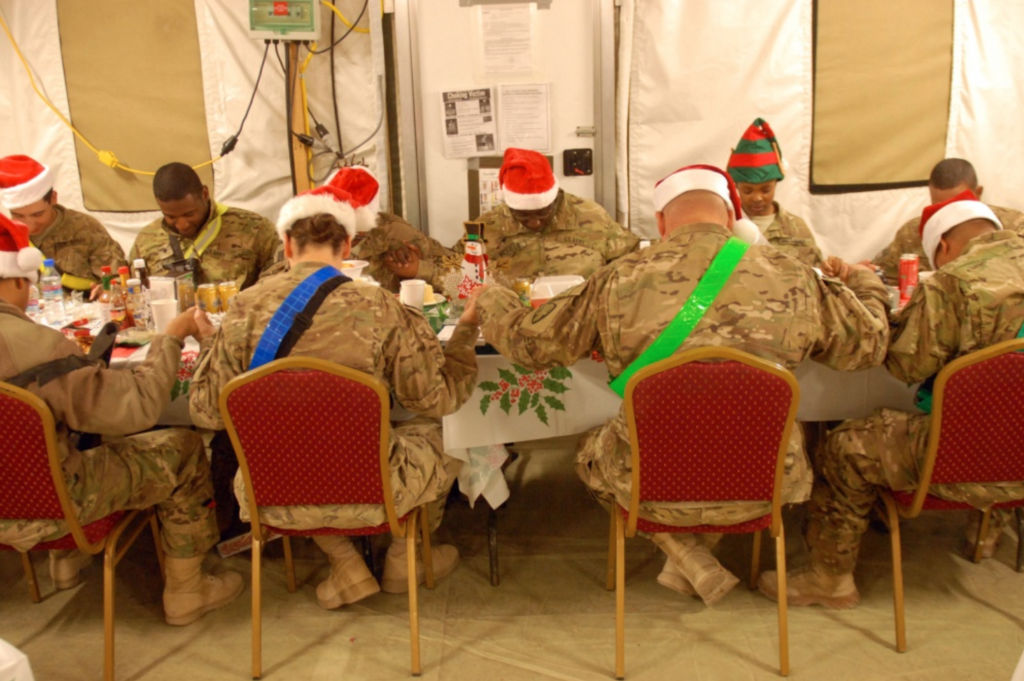 how deployed soldiers celebrate christmas praying over meal