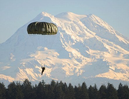 Paratrooper in front of a mountain