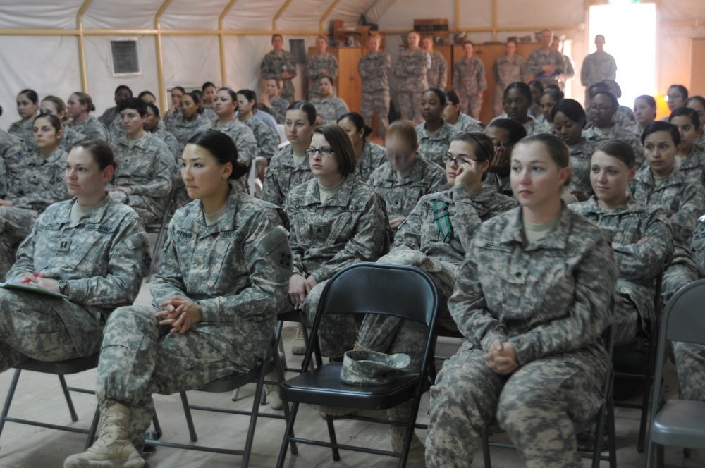 soldiers on active duty at a meeting