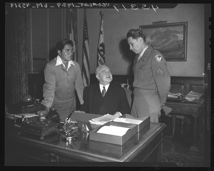 Captain Ira Hayes meeting the LA mayor after the flag raising in Iwo Jima