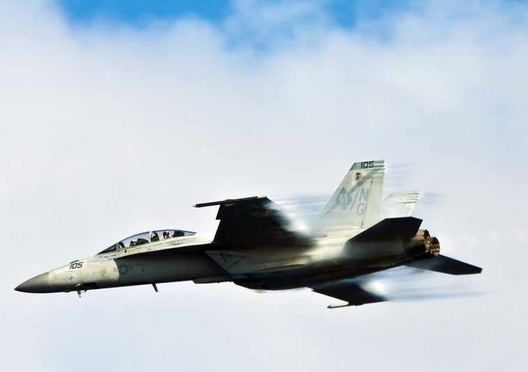 Take a moto break with these 11 photos of U.S. military fighters breaking the sound barrier