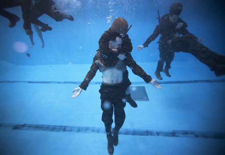 17 photos that show that the military’s water-survival training is no joke