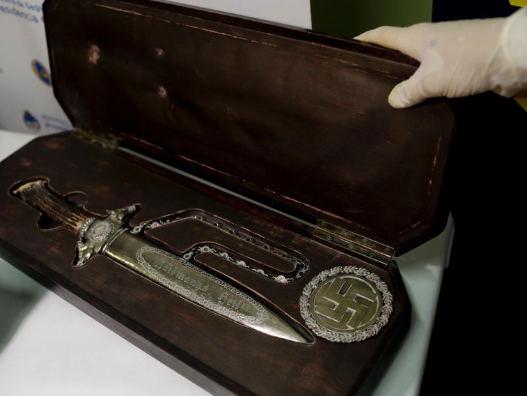Police just discovered a huge trove of Nazi artifacts hidden behind a bookcase in Argentina