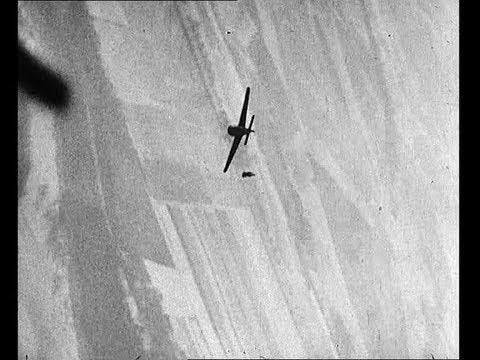  A pilot ejects from a dogfight in the skies over Normandy.