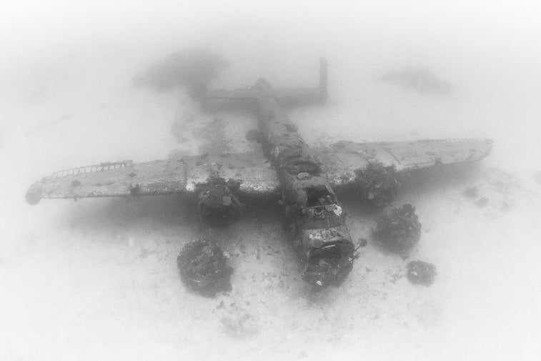 Amazing photos show an underwater graveyard filled with WWII airplanes