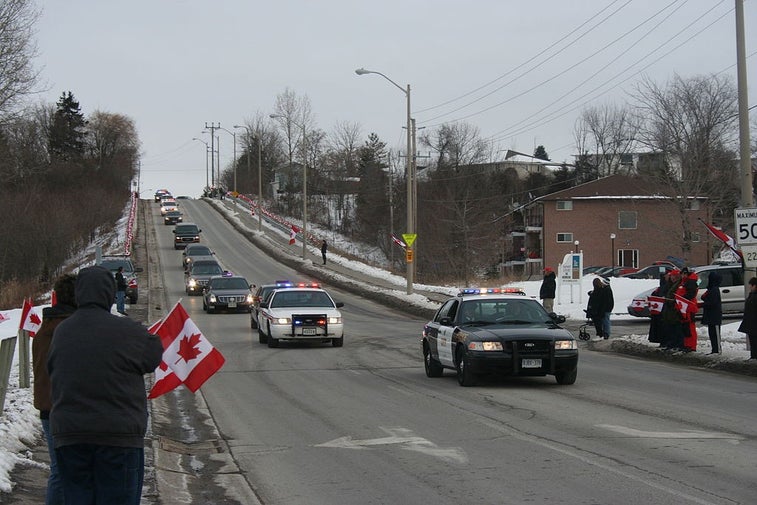 Canadians honor their fallen troops by lining the ‘Highway of Heroes’
