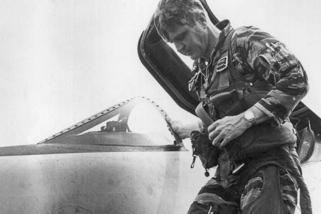  Stockdale climbing out of an F-8 before his capture (Photo by Stockdale Center) 