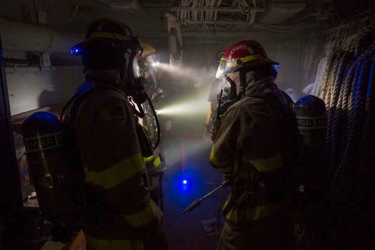 16 intense photos that show how sailors fight fires at sea