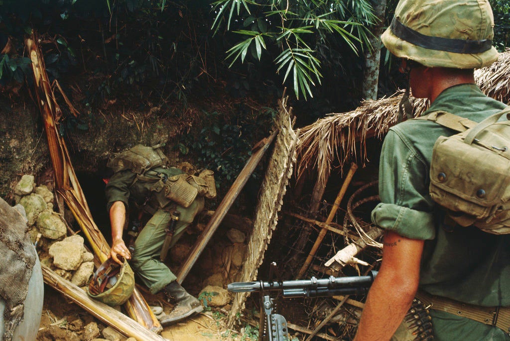 marines search Viet Cong tunnels