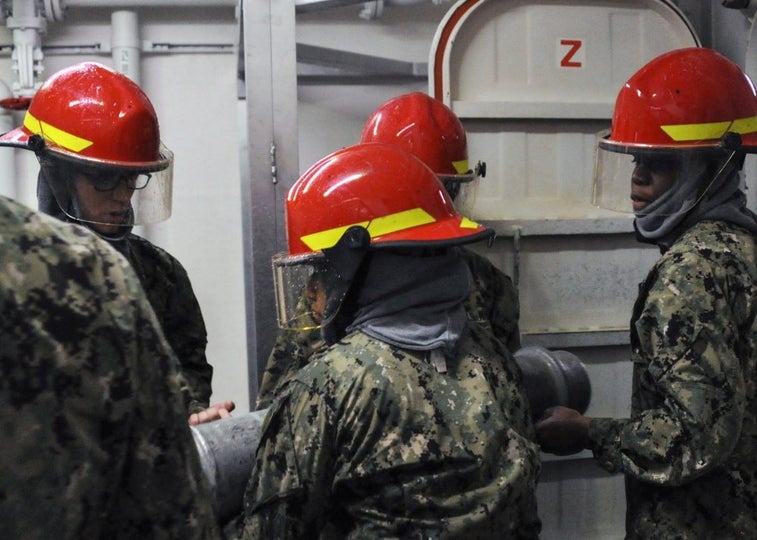 New sailors train on a replica of a guided missile destroyer