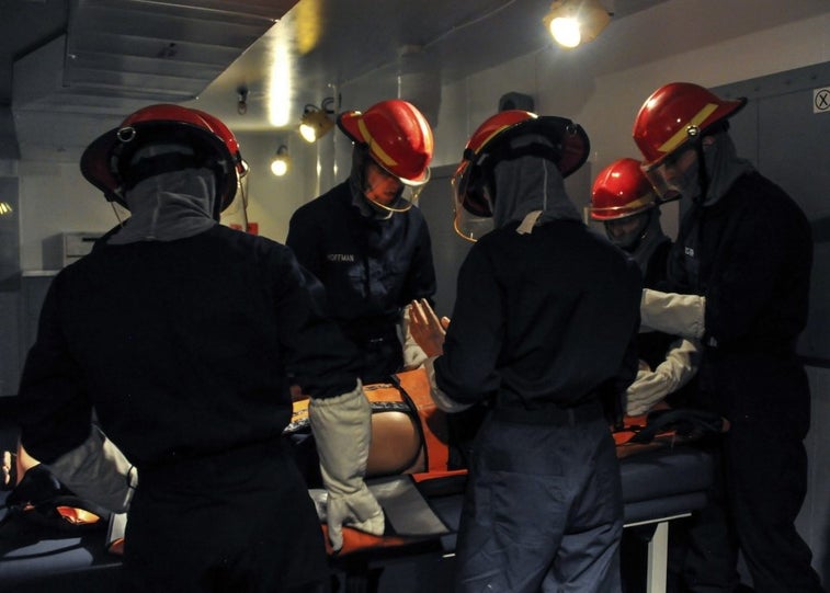 New sailors train on a replica of a guided missile destroyer