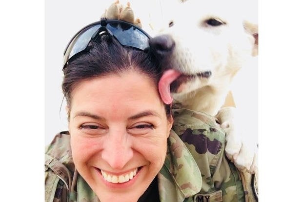A dog adopted by coalition troops fighting ISIS is finally home