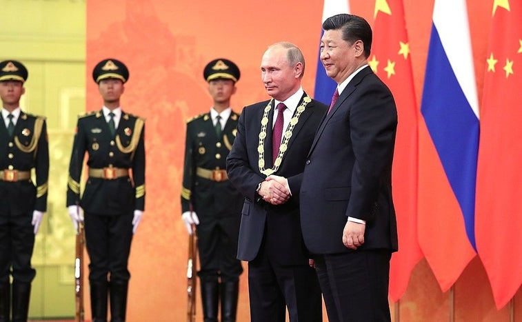 Putin, XI meet as their militaries start massive exercises