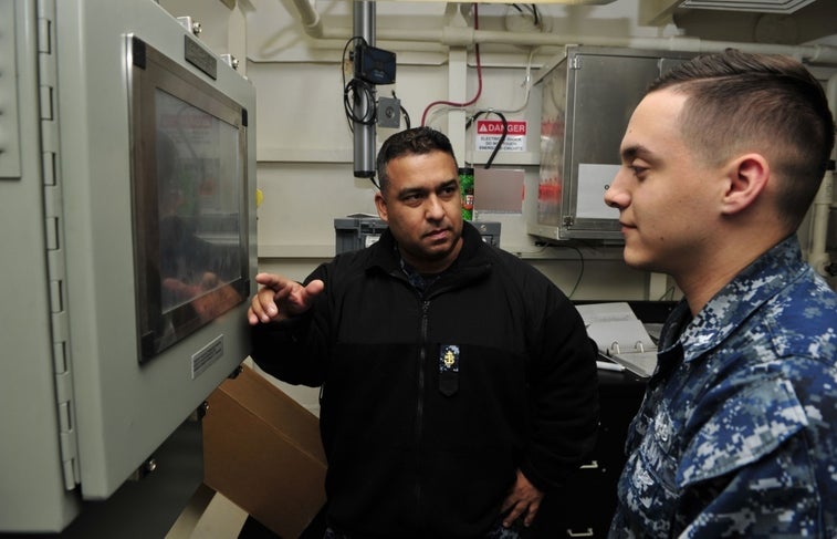 Sailors receive awards for brave actions after USS Cole attack