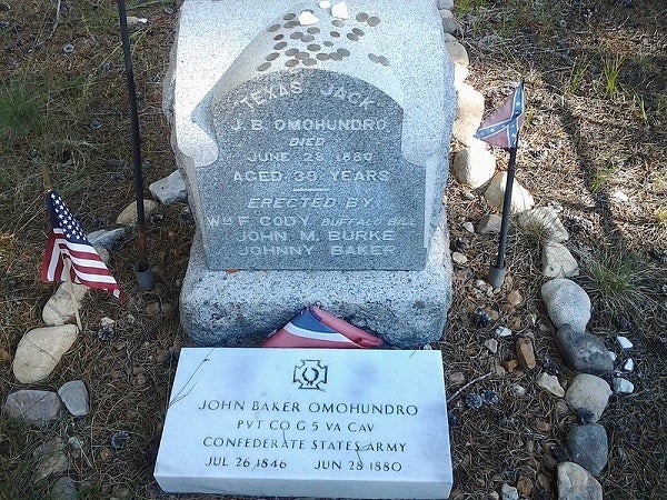 What happens to coins on military headstones?
