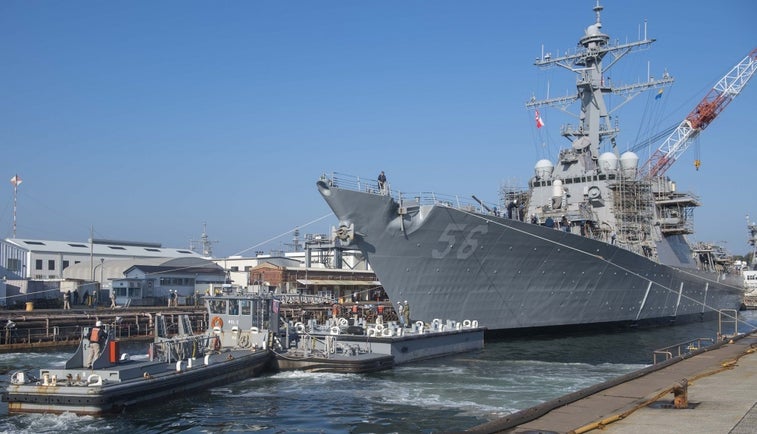 USS John S. McCain leaves drydock after crash damage