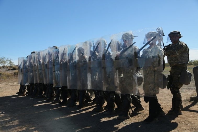 Troops on the border practice nonlethal riot control