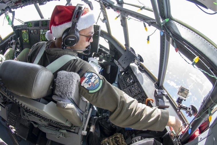 See the Air Force play Santa for thousands of islanders