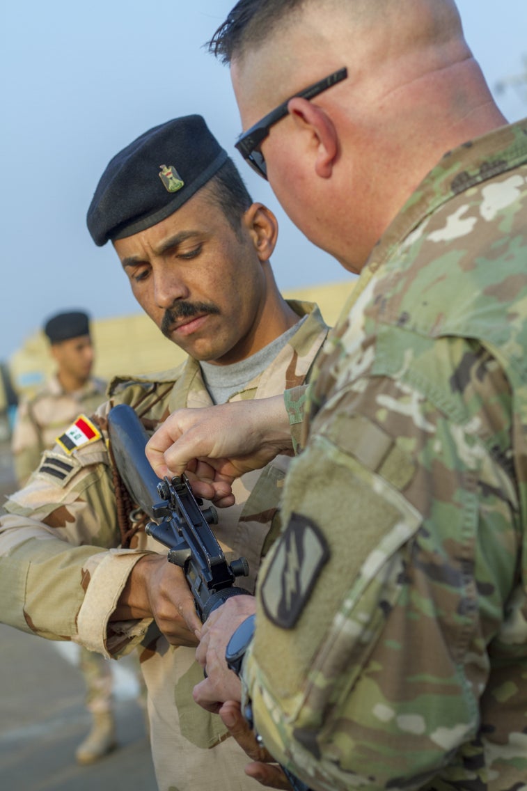 Soldiers share marksmanship tips with Iraqi forces