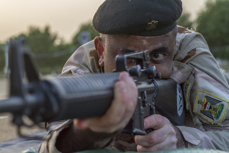 Soldiers share marksmanship tips with Iraqi forces