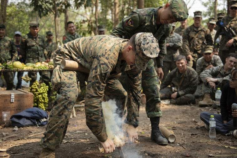 9 epic photos of Marines drinking snake blood and eating scorpions