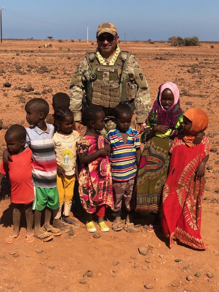 This soldier collected 500 pairs of sandals for barefoot orphans