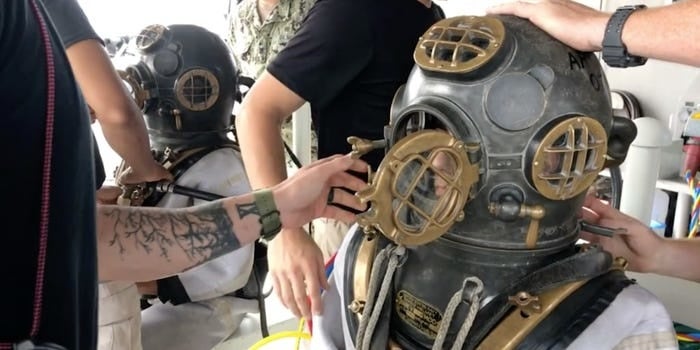 Divers wore 1940s gear to inter Pearl Harbor survivor on USS Arizona