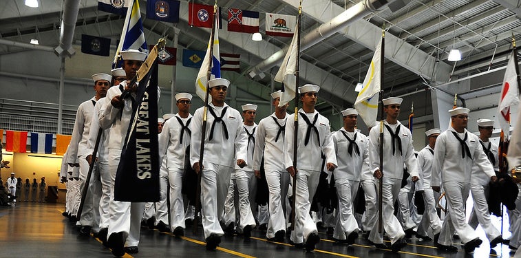 These married Ironman athletes just graduated together from Navy Boot Camp