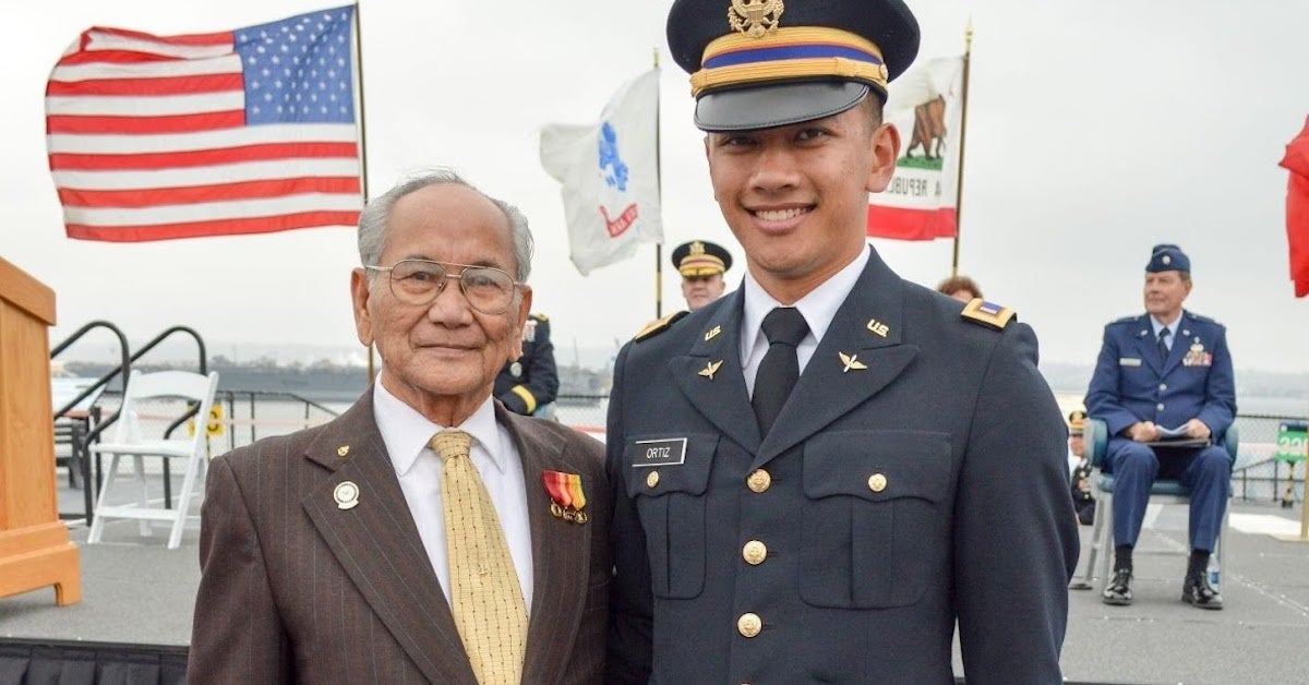 Tongson with the author at the commissioning ceremony (photo taken by Laceé Pappas/released)