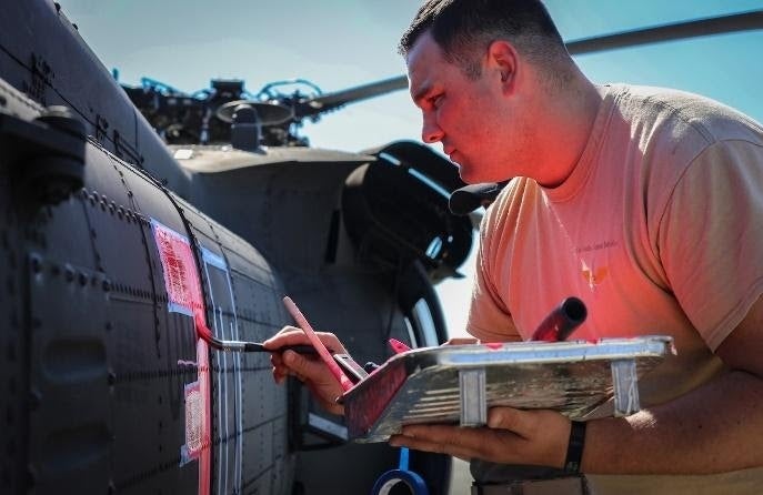 The reason these military helicopters are painted pink