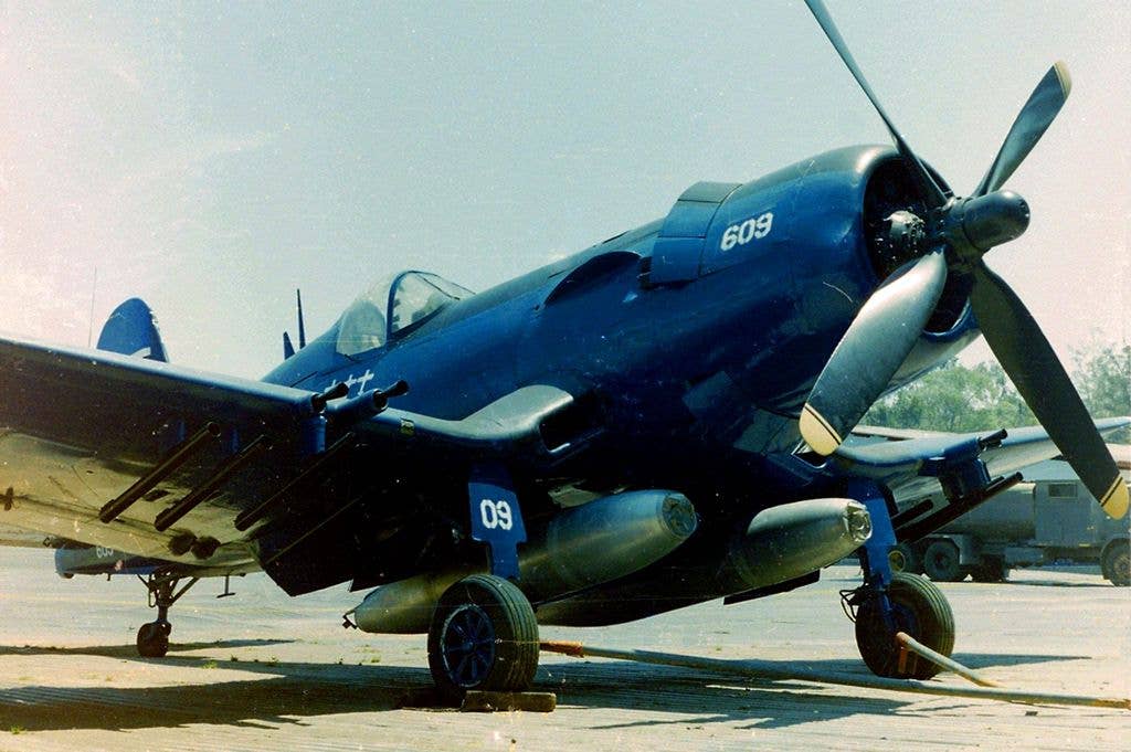 A Vought F4U-5NL Corsair (U.S. Navy BuNo 124715) on display at the Museo del Aire, Tegucigalpa (Honduras). This aircraft was sold to Honduras (s/n FAH-609) in 1956. In the so-called "Football War", Cap. Fernando Soto in FAH-609 shot down a Salvadoran air force Cavalier F-51D Mustang and two Goodyear FG-1D Corsairs on 17 July 1969 during the last known air combat between piston-engined aircraft. FAH-609 was finally retired in 1981.