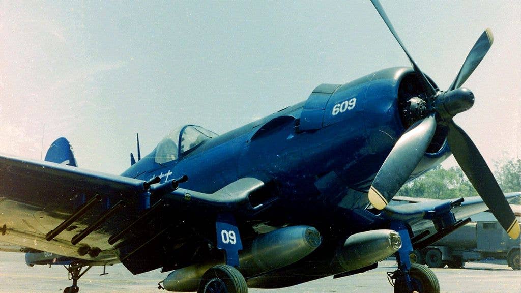 A Vought F4U-5NL Corsair (U.S. Navy BuNo 124715) on display at the Museo del Aire, Tegucigalpa (Honduras). This aircraft was sold to Honduras (s/n FAH-609) in 1956. In the so-called "Football War", Cap. Fernando Soto in FAH-609 shot down a Salvadoran air force Cavalier F-51D Mustang and two Goodyear FG-1D Corsairs on 17 July 1969 during the last known air combat between piston-engined aircraft. FAH-609 was finally retired in 1981.