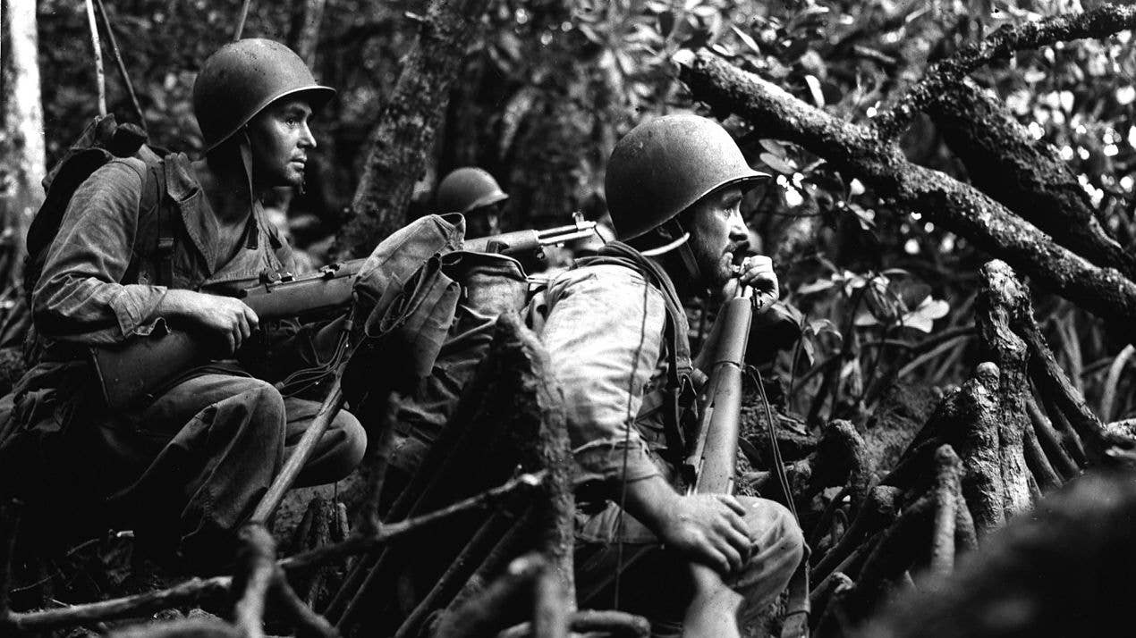 Vella Lavella. Infantrymen of Co. "I" await the word to advance in pursuit of retreating Japanese forces. Stepping Stone Island on the Vella Lavella Island Front, Southwest Pacific. (13 Sep 43). (Signal Corps Photo)