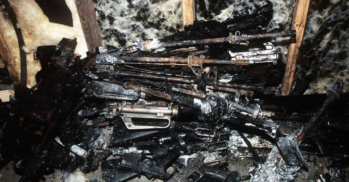 Charred weapons recovered from the wreckage of an Arrow Air DC-8 commercial aircraft are stored in a Gander Airport hangar for analysis by members of the Canadian Air Safety Board. The aircraft crashed at the airport with no survivors on December 12, 1985, while carrying 248 members of the 3rd Bn., 502nd Inf., 101st Airborne Div. They were returning to the United States after participating in peacekeeping duty with the Multi-national Force and Observers in the Sinai Desert. (Wikimedia Commons)