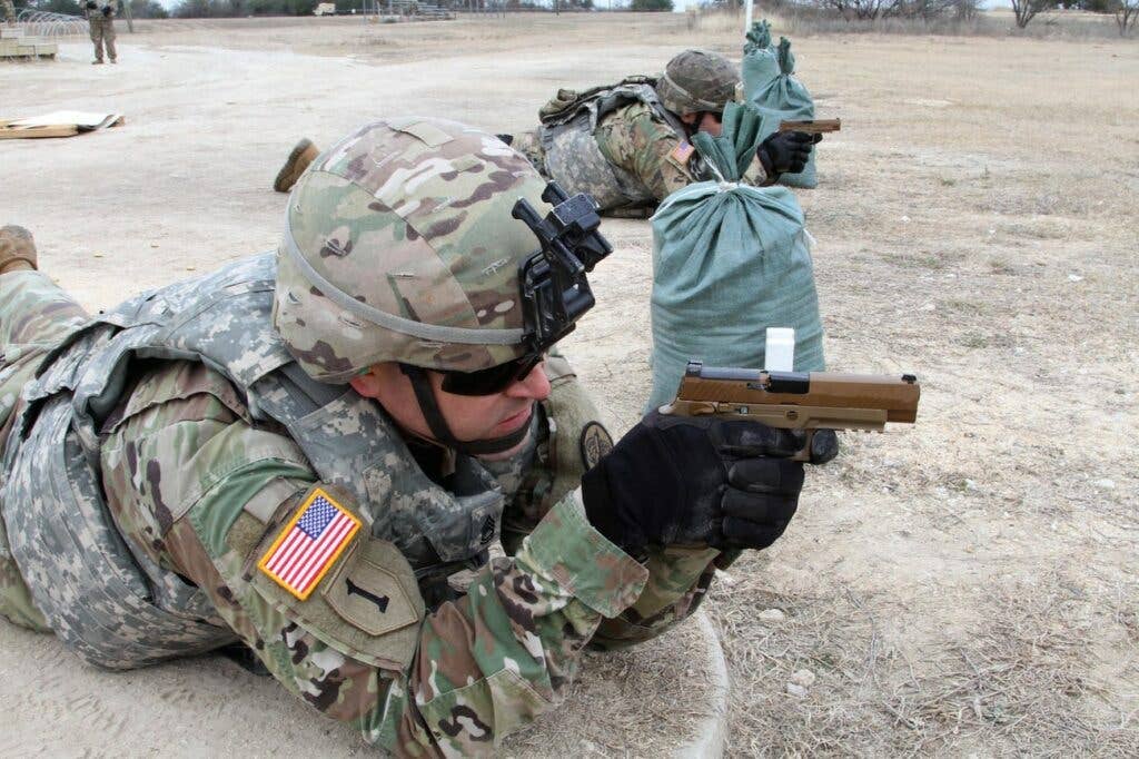 Sgt. 1st Class Rocky Butler with the new M17 during weapons qualification, at Fort Hood, Texas, January 19, 2018. <br>US Army/Staff Sgt. Taresha Hill