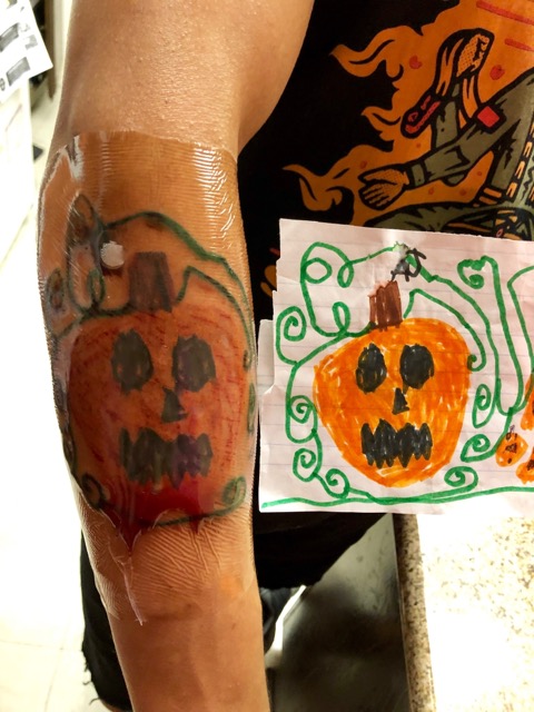 OG Pumpkin design and tattoo on Former Army Ranger Angel Cortes's arm. 