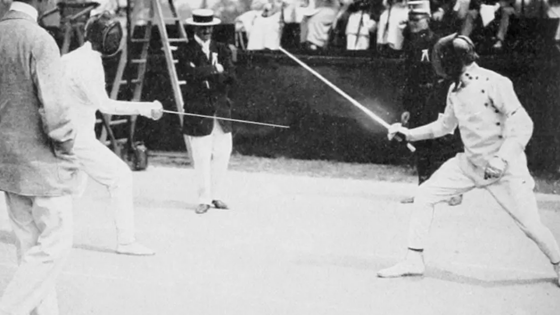 Patton (at right) fencing in the modern pentathlon of the 1912 Summer Olympics. (Wikipedia)