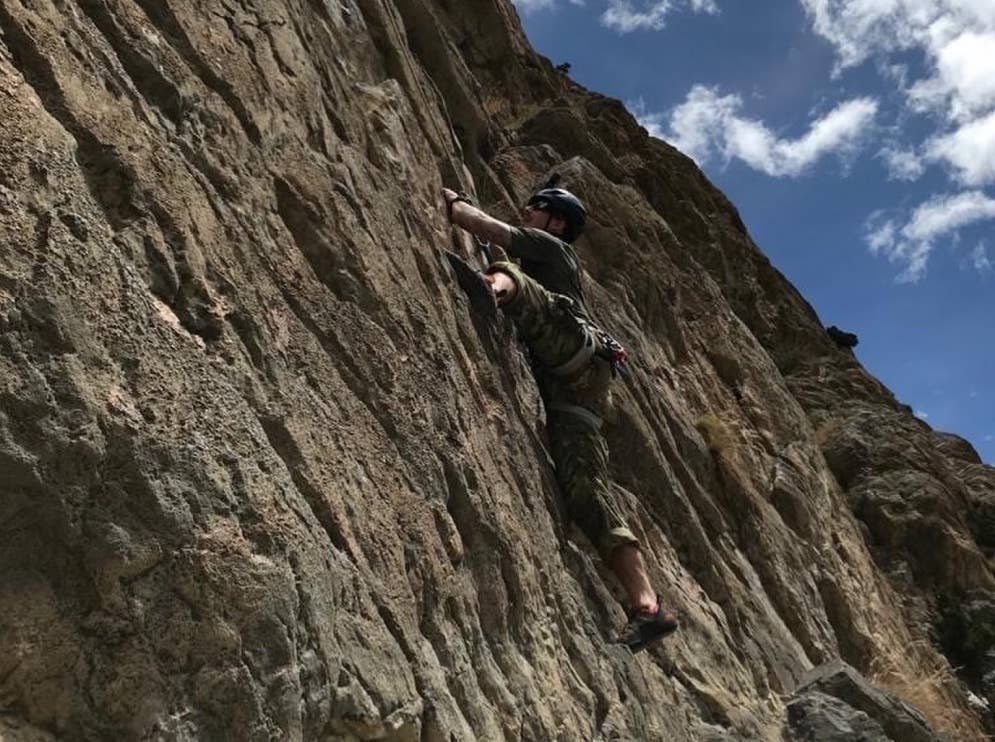 A Green Beret with 1st Battalion, 1st Special Forces Group (Airborne) scales a wall using mountaineering techniques taught at the Nepali Army’s High Altitude and Mountain Warfare School in Nepal, October 2020. US Army courtesy photo via DVIDS.