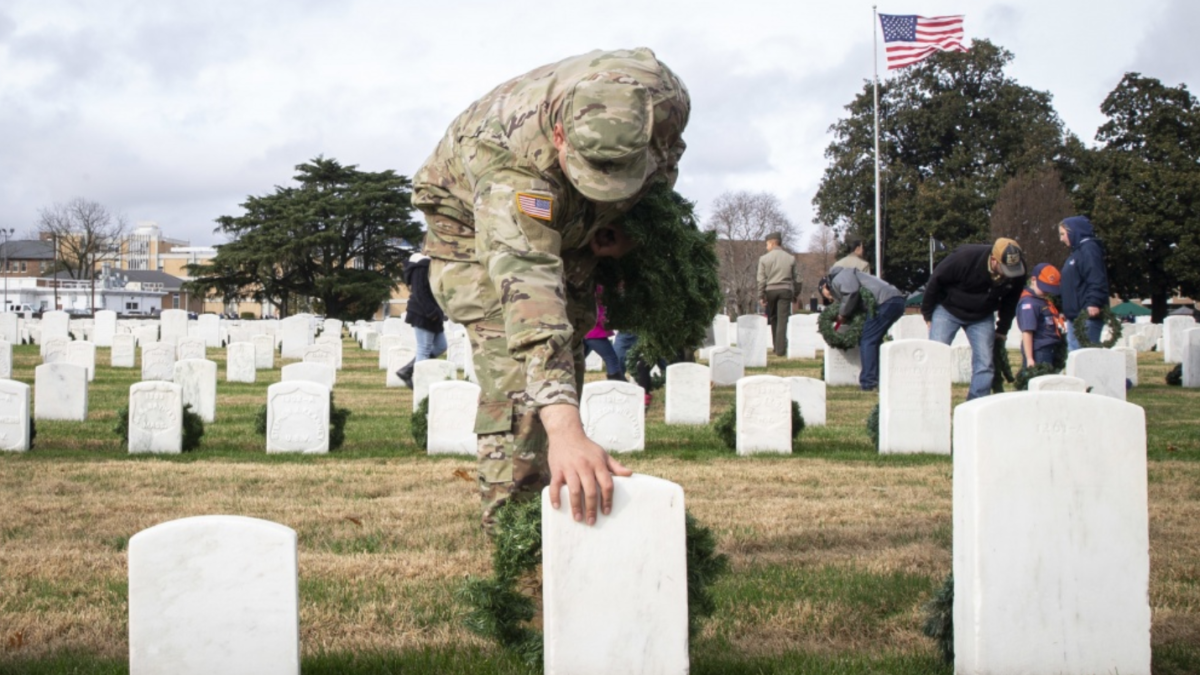 A soldier honors the fallen during WAA