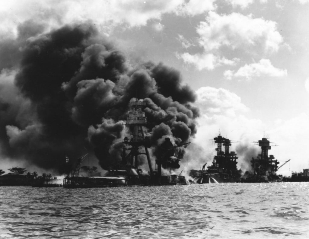 Ships burn at Pearl Harbor, Dec. 7, 1941.