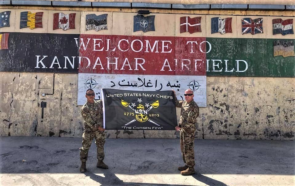 Photo of soldiers in front of Kandahar Airfield