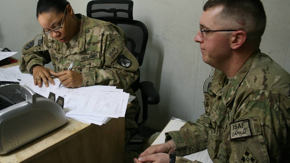 active duty troops working in office