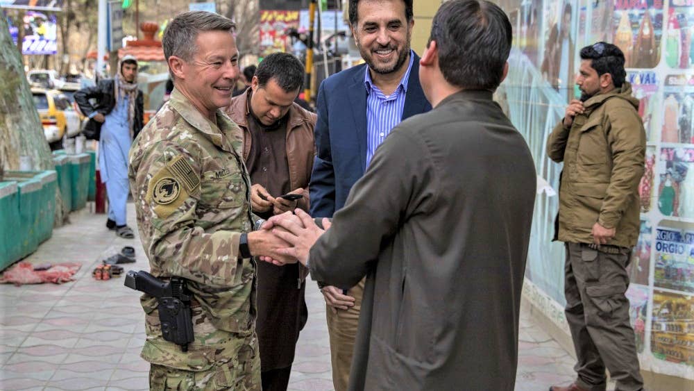 The longest-serving U.S. commander in Afghanistan stays strapped