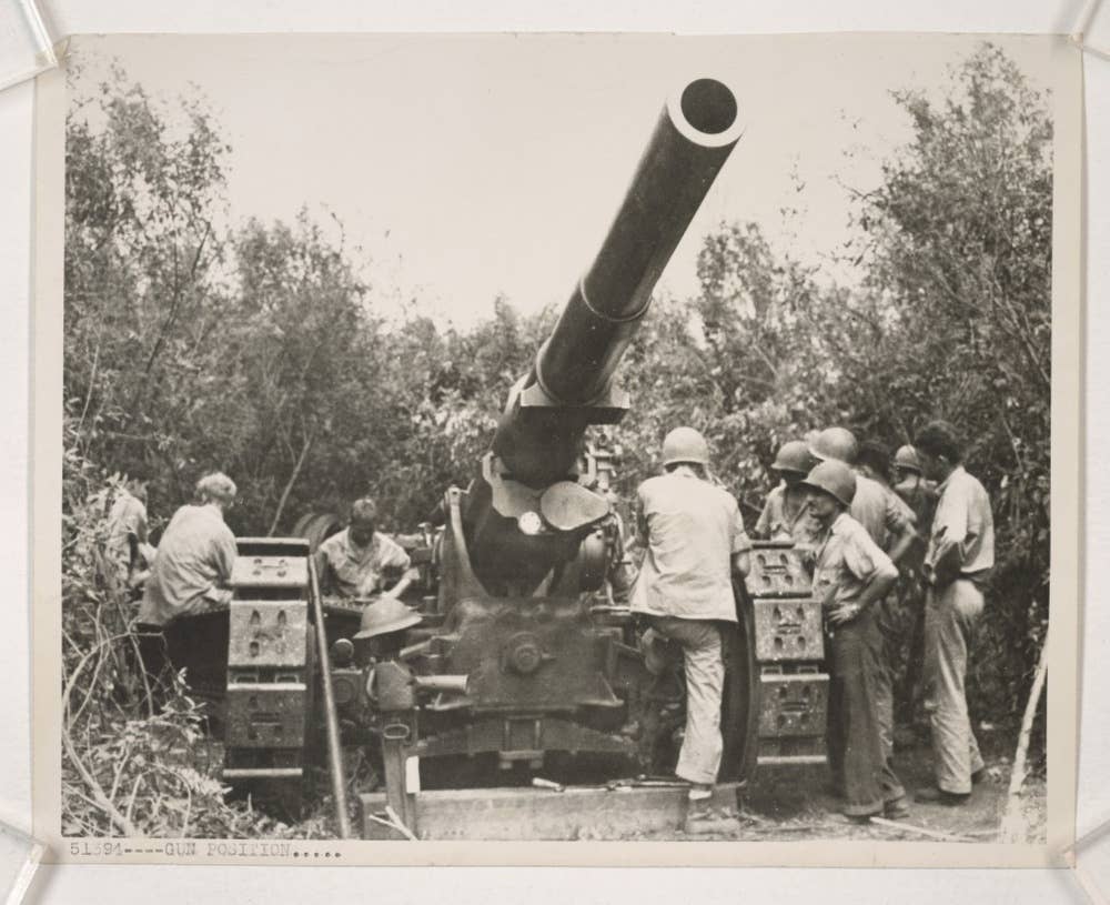 Marines work a 155mm gun position on Guadalcanal in 1942. National Archives photo