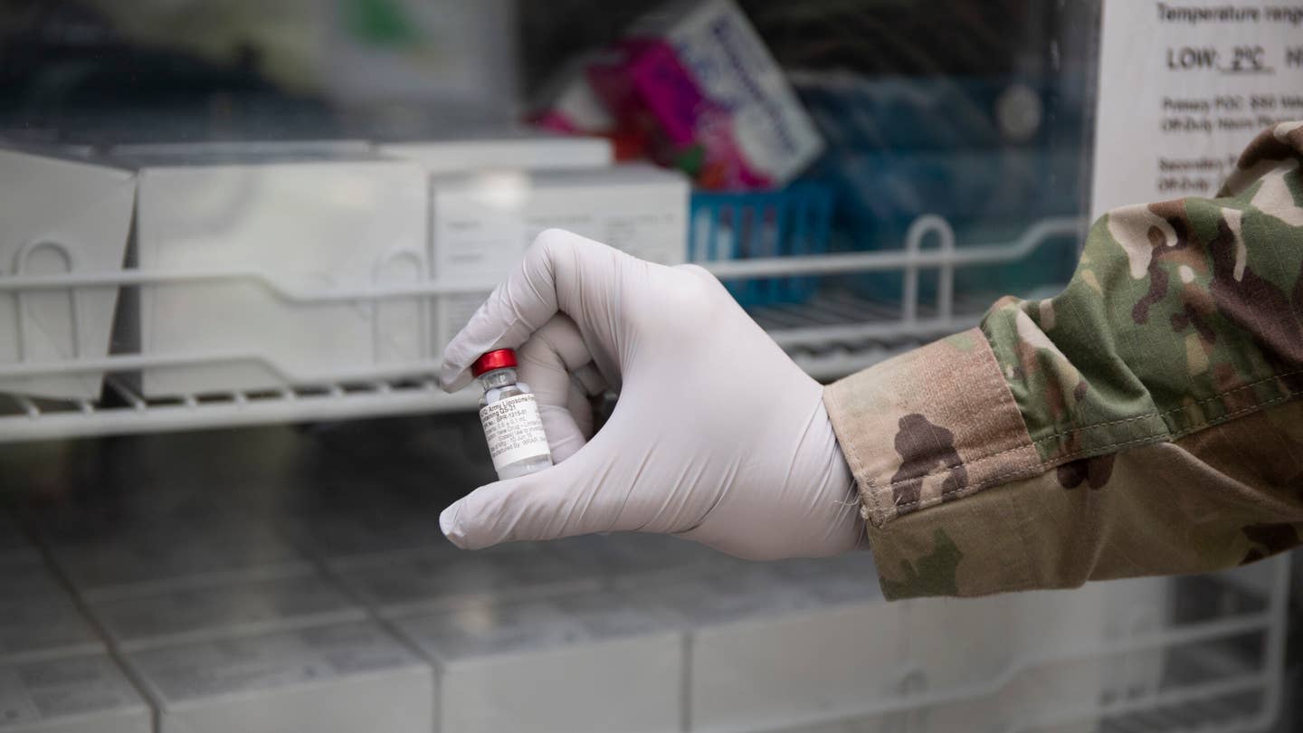 A vial of Army liposome formulation Q (ALF Q) is stored during the start of phase I clinical trials for WRAIR's COVID-19 vaccine, spike ferritin nanoparticle (SpFN) vaccine. ALF Q is an adjuvant, or compound used to boost the immune response, that is co-administered with SpFN.
