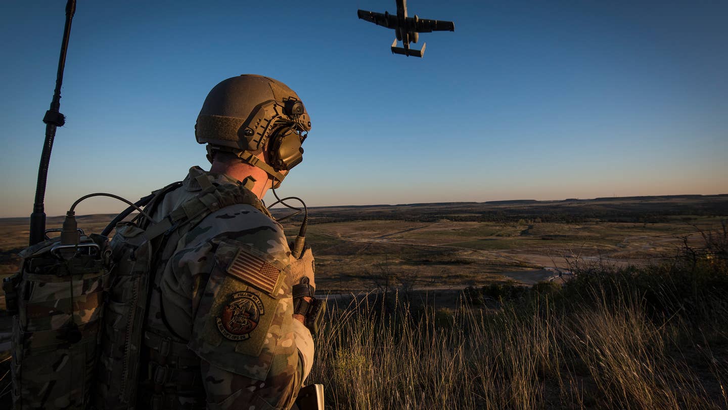 A Tactical Control Party Airmen and qualified Joint Terminal Aircraft Controller assigned to the 9th Air Support Operations Squadron at Fort Hood, Texas, directs an A-10 Thunderbolt II aircraft during a close-air-support exercise at Fort Hood, Texas Oct. 30, 2020. The 330th Recruiting Squadron used this exercise, along with the 2020 Lightning Challenge to publicize the capabilities of Special Warfare Airmen. (U.S. Air Force photo by Master Sgt. JT May III)
