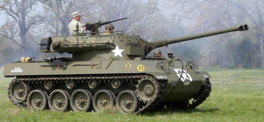 M18 Hellcat in action during a 2007 reenactment (<a href="https://commons.wikimedia.org/wiki/File:M18_hellcat_side.jpg">Wikimedia Commons</a>)